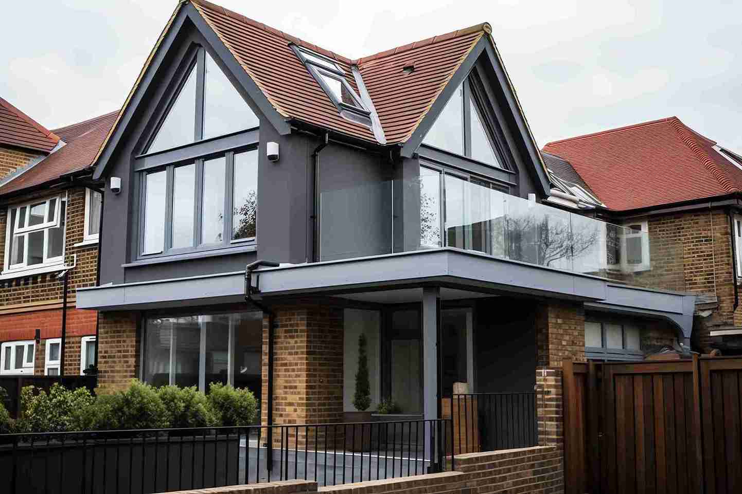 Newly constructed modern brick house with landscaped front garden and large windows in Romford, East London